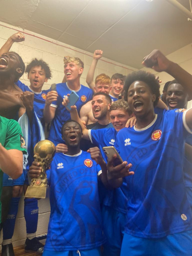FC United Academy team celebrate winning the AoC Sport Summer Series trophy